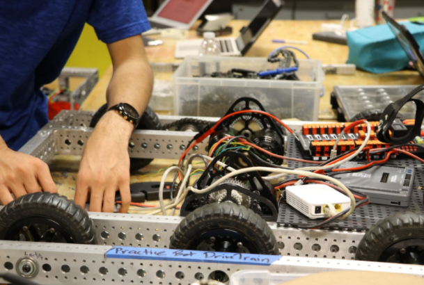 a team member working on the drive train