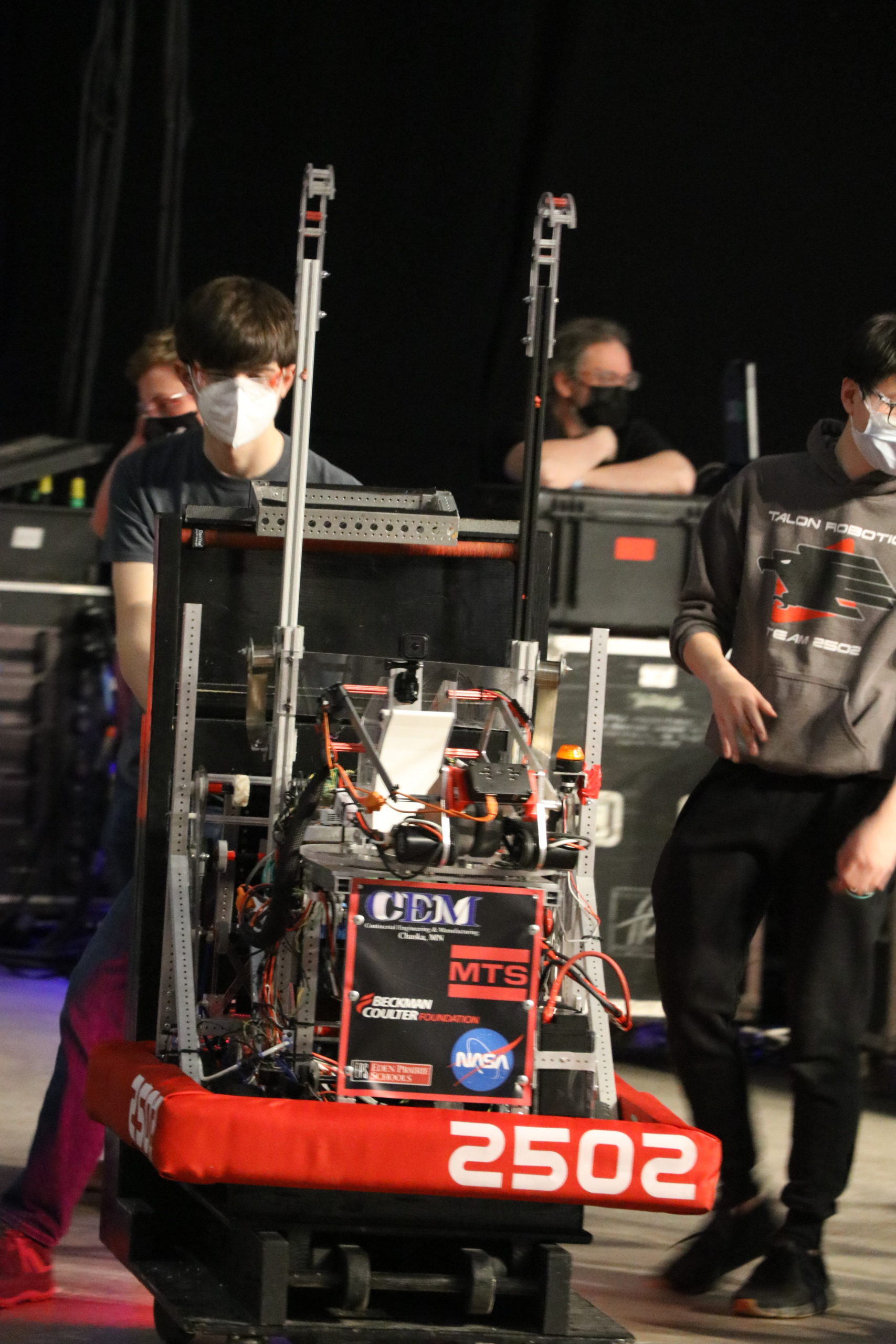 Our drive team moving the robot off of the field.