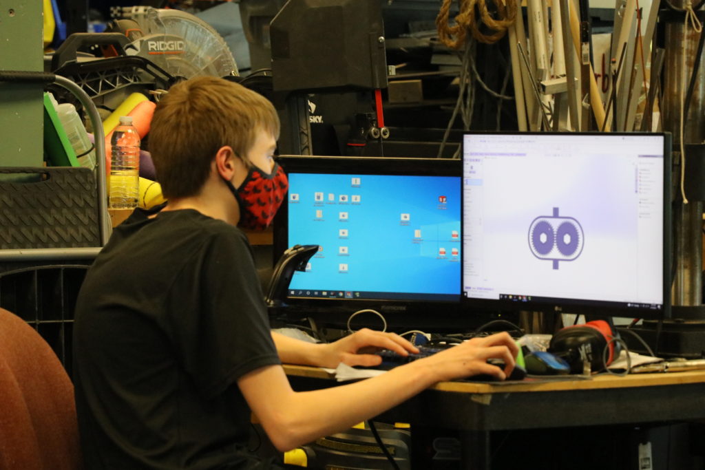 A student working on the cad computer.