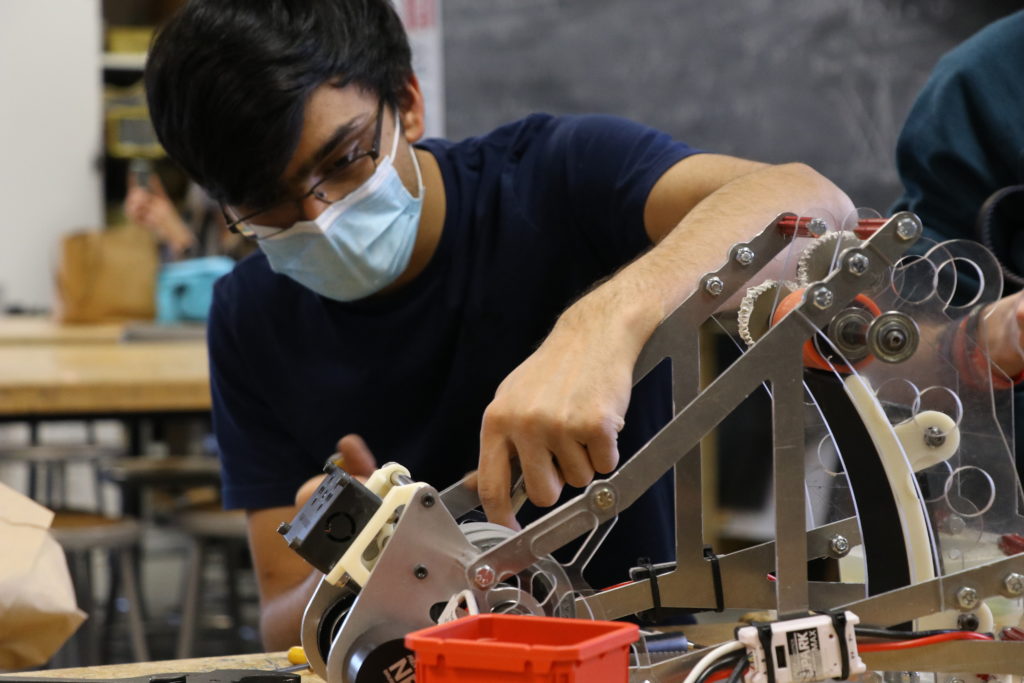 A student working on the turret model.