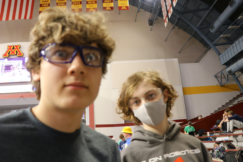 two students looking at the camera.