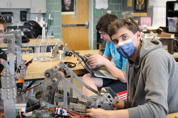 a student working on on the robot