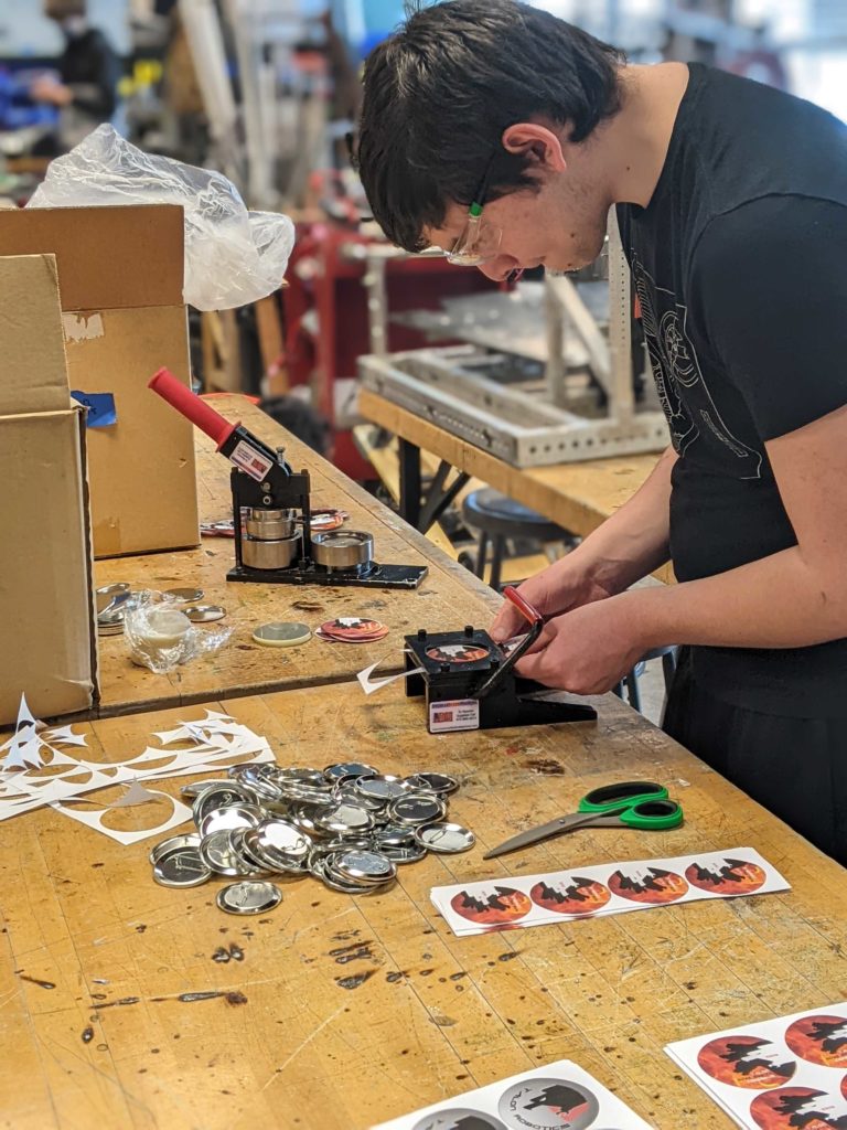 a student working on the button press