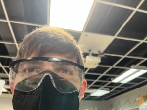 A photo of a student with his mask on 