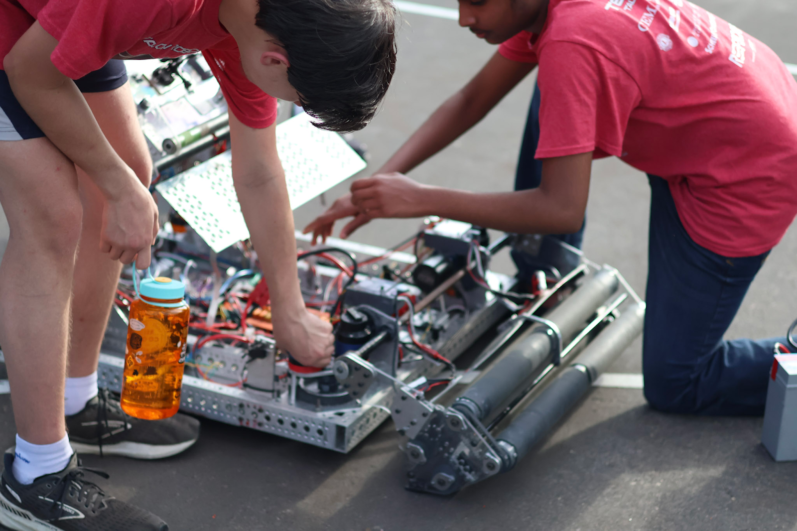Team members working on the motor of Cronus