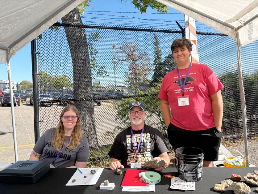A member of our team with two other event volunteers