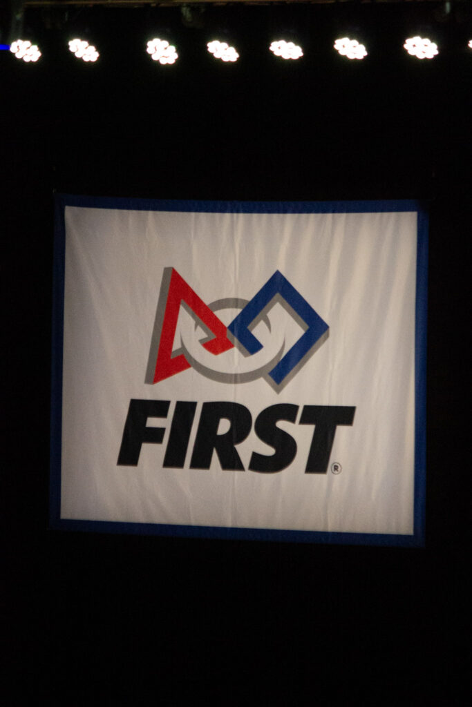 A FIRST flag hanging over the field