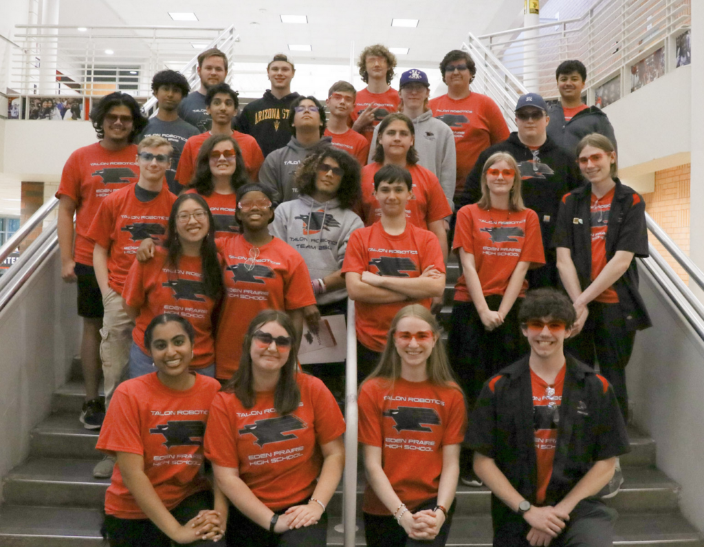 A team picture, the captains are smiling at the front