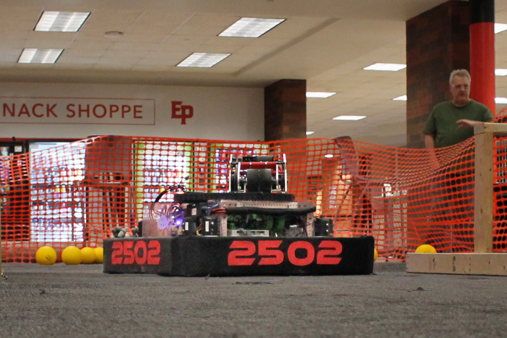 Our robot getting one final practice in at our school