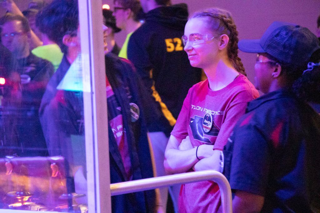 Ally, Brooke-Lynn, and Timothy behind the driver's station