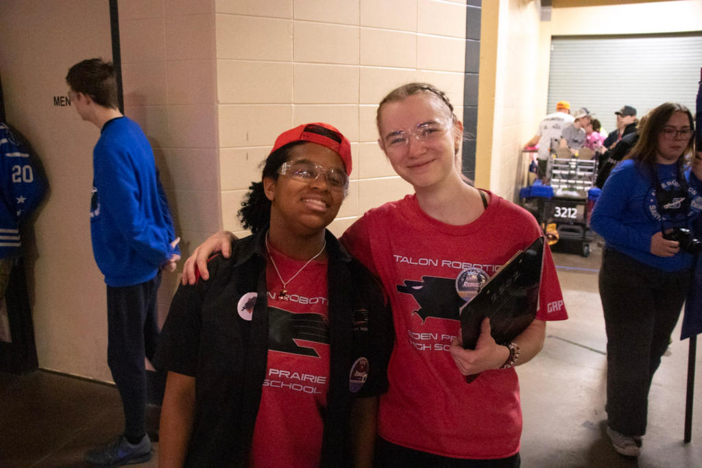 Ally and Brooke-Lynn smiling in the pits